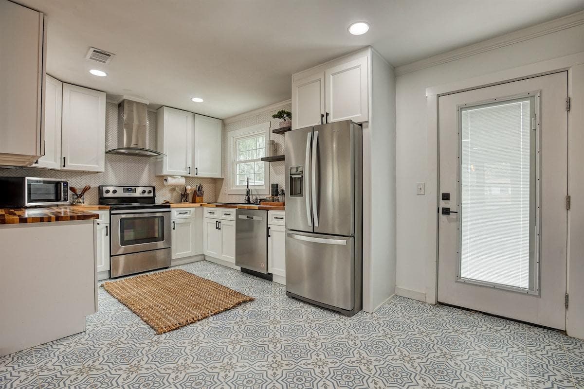 Full kitchen with pots pans to cook large family meals